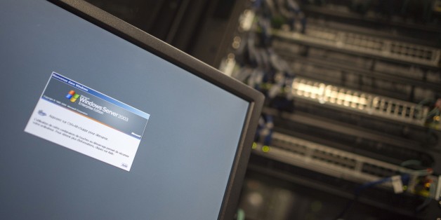 A computer running a Windows Server is seen connected into a network server in an office building in Washington, DC on May 13, 2017. International investigators hunted on May 13 for those behind an unprecedented cyber-attack that affected systems in dozens of countries, including at banks, hospitals and government agencies, as security experts sought to contain the fallout. The assault, which began Friday and was being described as the biggest-ever cyber ransom attack, struck state agencies and