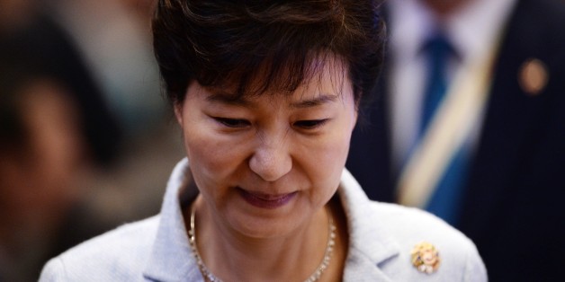 South Korean President Park Geun-hye attends the 17th ASEAN- Republic of Korea meeting during the 27th Association of Southeast Asian Nations ( ASEAN ) Summit at the Kuala Lumpur on November 22, 2015. Southeast Asian leaders November 22 symbolically declared the establishment by year-end of an EU-style regional economic bloc, but diplomats admitted it will be years before the vision of a single market can be realised. AFP PHOTO / MANAN VATSYAYANA (Photo credit should read MANAN VATSYAY