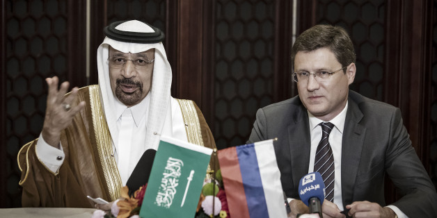 Khalid Bin Abdulaziz Al-Falih, Saudi Arabia's energy minister, left, speaks as Alexander Novak, Russia's energy minister, looks on during a news conference on the sidelines of the Belt and Road Forum for International Cooperation in Beijing, China, on Monday, May 15, 2017. Saudi Arabia and Russia said they favor prolonging oil-output cuts by global producers through the end of the first quarter of 2018, setting a firmer timeframe for a likely extension of the curbs into next year. Crude price