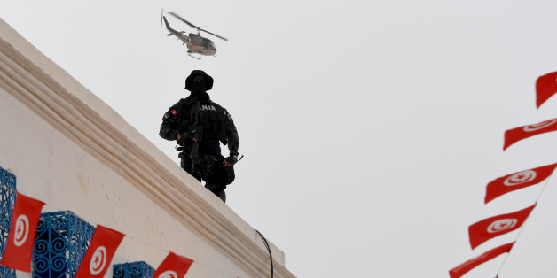 Tunisian special forces stand guard outside the Ghriba synagogue on the Tunisian resort island of Djerba on May 12, 2017 during the first day of the annual Jewish pilgrimage to the synagogue on the Mediterranean resort island of Djerba. / AFP PHOTO / FETHI BELAID (Photo credit should read FETHI BELAID/AFP/Getty Images)