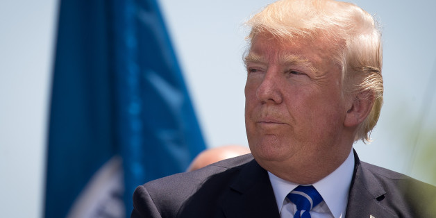 NEW LONDON, CT - MAY 17: US President Donald Trump attends the commencement ceremony at the U.S. Coast Guard Academy, May 17, 2017 in New London, Connecticut. This is President Trump's second commencement address since taking office and comes amid controversy after his firing of FBI Director James Comey. (Photo by Drew Angerer/Getty Images)