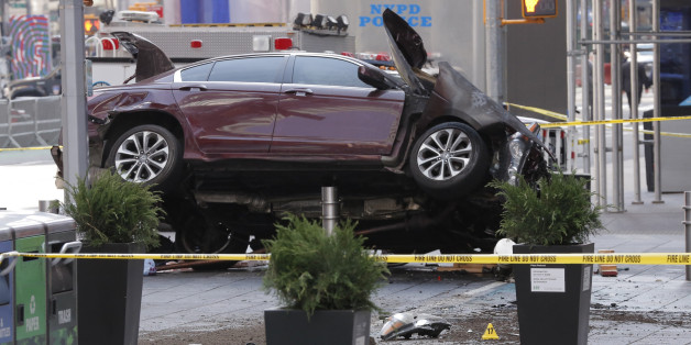 The remains of the vehicle that drove onto a sidewalk and struck pedestrians are cordoned off in Times Square in New York, U.S., May 18, 2017. REUTERS/Lucas Jackson