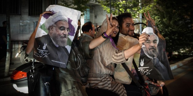TEHRAN, IRAN- MAY 20: Supporters of President Hassan Rouhani celebrate after the results of the Iran vote were announced, in Tehran, Iran on May 20, 2017. (Photo by Fatemeh Bahrami/Anadolu Agency/Getty Images)