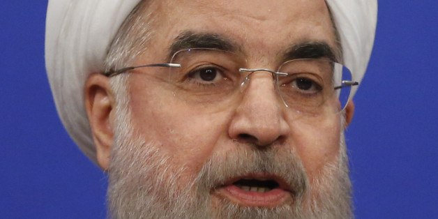 Newly re-elected Iranian President Hassan Rouhani speaks during a televised speech in the capital Tehran on May 20, 2017. Iranians have chosen the 'path of engagement with the world' and rejected extremism, President Hassan Rouhani said following his resounding re-election victory. / AFP PHOTO / ATTA KENARE (Photo credit should read ATTA KENARE/AFP/Getty Images)