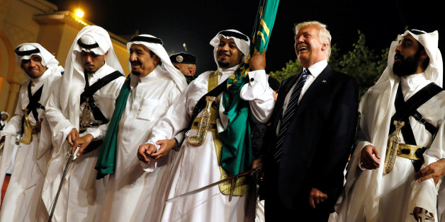 U.S. President Donald Trump dances with a sword as he arrives to a welcome ceremony by Saudi Arabia's King Salman bin Abdulaziz Al Saud at Al Murabba Palace in Riyadh, Saudi Arabia May 20, 2017. REUTERS/Jonathan Ernst