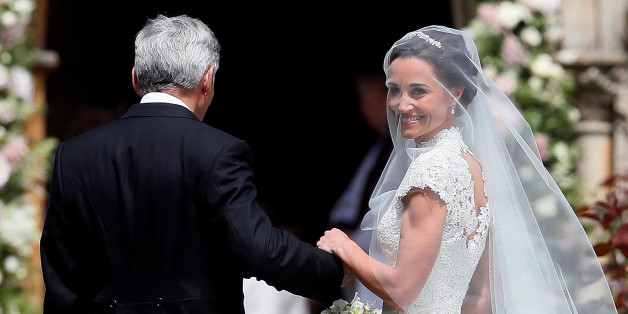 Pippa Middleton, the sister of Britain's Catherine, Duchess of Cambridge, arrives with her father Michael Middleton for her wedding to James Matthews at St Mark's Church in Englefield, west of London, on May 20, 2017. REUTERS/Kirsty Wrigglesworth/Pool TPX IMAGES OF THE DAY