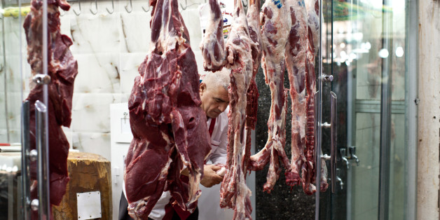 SULAIMANIYAH, IRAQ: A butcher's shop in the bazaar of the Kurdish city of Sulaimaniyah. On June 10th, ISIS fighters took control of the Iraqi city of Mosul. Since then they have made large advances across northern Iraq, threatening the autonomous Kurdish region and displacing over a million Iraqis, many of them Christian and Yezidi minorities. Photo by Sebastian Meyer (Photo by Sebastian Meyer/Corbis via Getty Images)