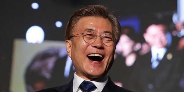 SEOUL, SOUTH KOREA - MAY 09: South Korean President-elect Moon Jae-in, of the Democratic Party of Korea, celebrates with supporters at Gwanghwamun Square on May 9, 2017 in Seoul, South Korea. Moon Jae-in declared victory in South Korea's presidential election, which was called seven months early after former President Park Geun-hye was impeached for her involvement in a corruption scandal. (Photo by Chung Sung-Jun/Getty Images)