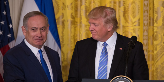 US President Donald Trump and Israeli Prime Minister Benjamin Netanyahu shake hands during a joint press conference in the East Room of the White House in Washington, DC, February 15, 2017. (Photo by Cheriss May/NurPhoto via Getty Images)