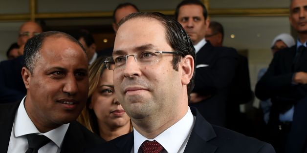 Tunisian Prime Minister Youssef Chahed arrives at an official speech delivered by the Tunisian President Beji Caid Essebsi (unseen) on May 10, 2017 in Tunis.
Essebsi said that the army will protect the output of Tunisia's main resources from being disrupted by protests over social and labour issues. / AFP PHOTO / FETHI BELAID (Photo credit should read FETHI BELAID/AFP/Getty Images)