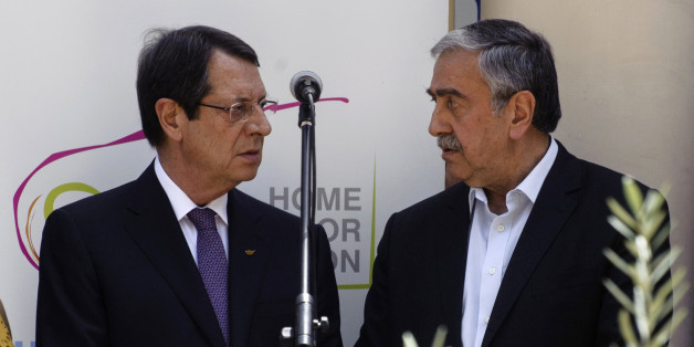 Greek Cypriot President Nicos Anastasiades (L) and Turkish Cypriot leader Mustafa Akinci (R) talk during a social function in Nicosias UN-patrolled buffer zone on June 2, 2016.
Cypriot leaders agreed in the meeting to resume their stalled peace talks on June 8 after President Nicos Anastasiades had suspended the UN-brokered negotiations. Talks were shelved after Anastasiades snubbed a dinner held for state leaders at a UN-organised humanitarian summit in Istanbul when he found out that Akinci was also invited.
/ AFP / Iakovos Hatzistavrou (Photo credit should read IAKOVOS HATZISTAVROU/AFP/Getty Images)