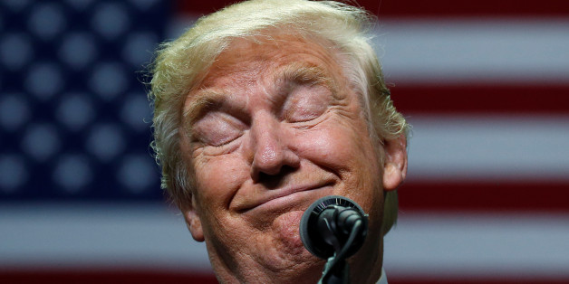 Republican presidential nominee Donald Trump attends a campaign event in Hershey, Pennsylvania, U.S. November 4, 2016. REUTERS/Carlo Allegri TPX IMAGES OF THE DAY