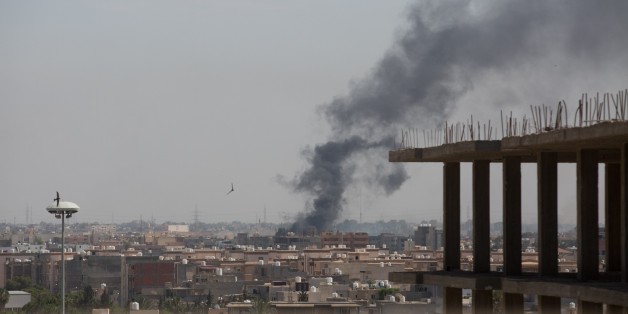 TRIPOLI, LIBYA - MAY 26: Smoke rises after clashes between National Reconciliation Government of Libya and National Liberation Government in Tripoli, Libya on May 26, 2017. (Photo by Stringer/Anadolu Agency/Getty Images)