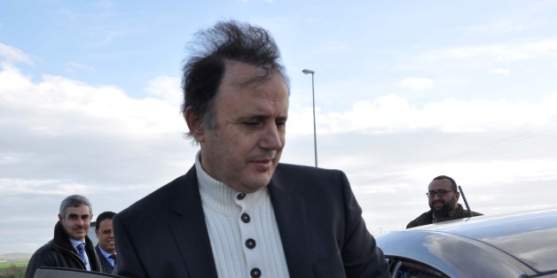 The son-in-law of Tunisia's ousted autocrat Zine El Abidine Ben Ali, businessman Slim Chiboub gets in his car as he leaves Mornaguia prison after being released from prison on January 12, 2016 outside Tunis. / AFP / MOHAMED KHALIL (Photo credit should read MOHAMED KHALIL/AFP/Getty Images)
