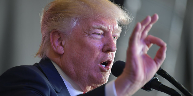 US President Donald Trump addresses US military personnel and families at Naval Air Station Sigonella after G7 summit of Heads of State and Government, on May 27, 2017 near Taormina in Sicily. / AFP PHOTO / MANDEL NGAN (Photo credit should read MANDEL NGAN/AFP/Getty Images)