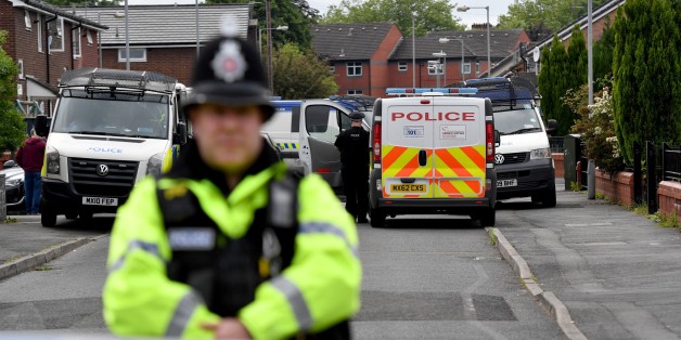 MANCHESTER, ENGLAND - MAY 28: Police close the road leading to Quantock Street in the Moss Side area of Manchester where a raid was carried out earlier on May 28, 2017 in Manchester, England. Security in the city remains high since the Manchester Arena suicide bombing which killed 22 people on the evening of May 22 as concert goers were leaving the venue after an Ariana Grande performance. (Photo by Anthony Devlin/Getty Images)