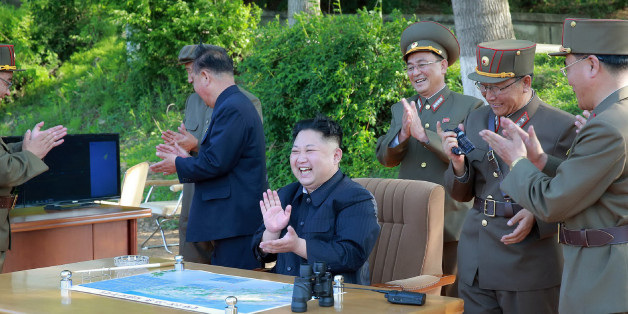 This undated picture released from North Korea's official Korean Central News Agency (KCNA) on May 22, 2017 shows North Korean leader Kim Jong-Un (C) inspecting the test-fire of a ground-to-ground medium-to-long range strategic ballistic missile Pukguksong-2.
North Korea on May 22 declared its medium-range Pukguksong-2 missile ready for deployment after a weekend test, the latest step in its quest to defy UN sanctions and develop a weapon capable of striking US targets. / AFP PHOTO / KCNA VIA KNS / STR / South Korea OUT / REPUBLIC OF KOREA OUT ---EDITORS NOTE--- RESTRICTED TO EDITORIAL USE - MANDATORY CREDIT 'AFP PHOTO/KCNA VIA KNS' - NO MARKETING NO ADVERTISING CAMPAIGNS - DISTRIBUTED AS A SERVICE TO CLIENTS
THIS PICTURE WAS MADE AVAILABLE BY A THIRD PARTY. AFP CAN NOT INDEPENDENTLY VERIFY THE AUTHENTICITY, LOCATION, DATE AND CONTENT OF THIS IMAGE. THIS PHOTO IS DISTRIBUTED EXACTLY AS RECEIVED BY AFP. / (Photo credit should read STR/AFP/Getty Images)