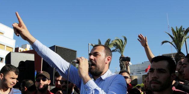 Moroccan activist and the leader of the protest movement Nasser Zefzafi gives a speech during a demonstration in the northern town of Al-Hoceima, seven months after a fishmonger was crushed to death inside a garbage truck as he tried to retrieve fish confiscated by the police, in Al-Hoceima, Morocco May 18, 2017. REUTERS/Youssef Boudlal