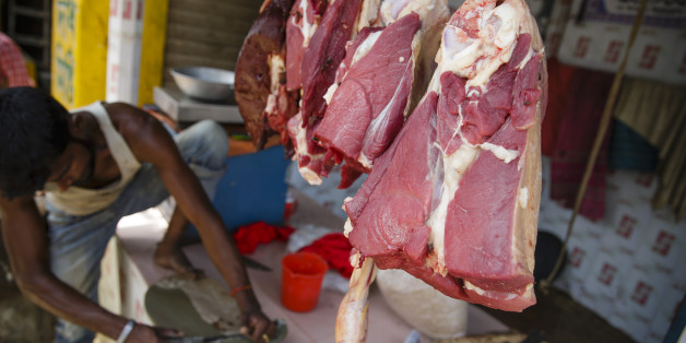 Savar, Bangladesh - April 13: Meat is offered for sale at a market stall on April 13, 2016 in Savar, Bangladesh. (Photo by Thomas Trutschel/Photothek via Getty Images)