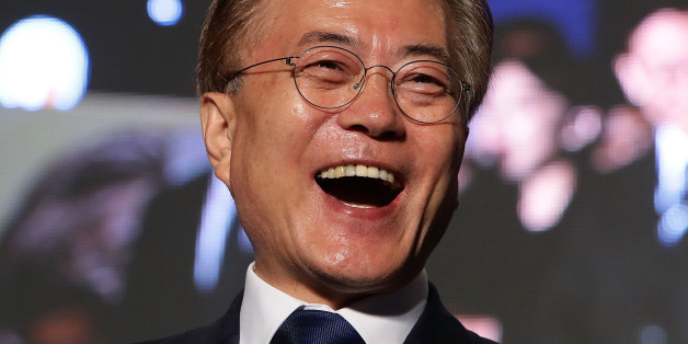 SEOUL, SOUTH KOREA - MAY 09: South Korean President-elect Moon Jae-in, of the Democratic Party of Korea, celebrates with supporters at Gwanghwamun Square on May 9, 2017 in Seoul, South Korea. Moon Jae-in declared victory in South Korea's presidential election, which was called seven months early after former President Park Geun-hye was impeached for her involvement in a corruption scandal. (Photo by Chung Sung-Jun/Getty Images)