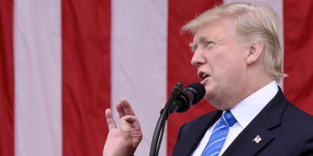 U.S. President Donald Trump speaks at a wreath laying ceremony at the Tomb of the Unknown Soldier at Arlington National Cemetery in Arlington, Virginia, U.S., on Monday, May 29, 2017. On Memorial Day, Trump visited Arlington National Cemetery to honor the memory of fallen service men and women. Photographer: Olivier Douliery/Pool via Bloomberg