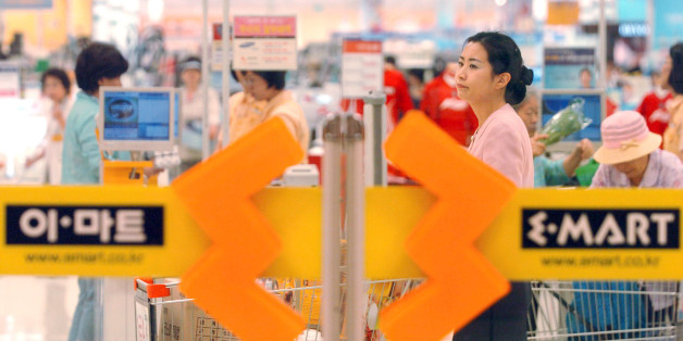 SOUTH KOREA - MAY 24: A South Korean customer shops at E-Mart in Seoul, Korea in Wednesday, May 24, 2006. (Photo by Seokyong Lee/Bloomberg via Getty Images)