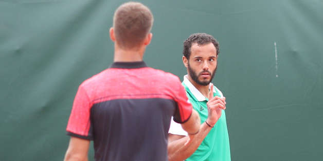 2017 French Open Tennis Tournament - Day Three. Laurent Lokoli of France refuses to shake hands with winner Martin Klizan of Slovakia during a tension filled Men's Singles round one match at the 2017 French Open Tennis Tournament at Roland Garros on May 30th, 2017 in Paris, France. (Photo by Tim Clayton/Corbis via Getty Images)