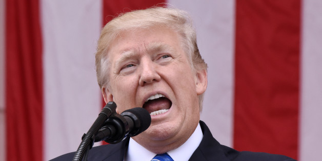 U.S. President Donald Trump speaks at a wreath laying ceremony at the Tomb of the Unknown Soldier at Arlington National Cemetery in Arlington, Virginia, U.S., on Monday, May 29, 2017. On Memorial Day, Trump visited Arlington National Cemetery to honor the memory of fallen service men and women. Photographer: Olivier Douliery/Pool via Bloomberg