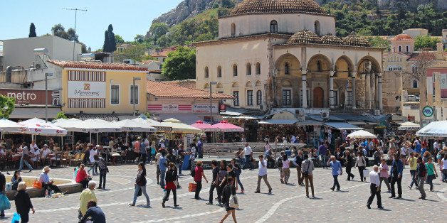 Athens, Greece - May 05, 2015: Famous Monastiraki square with people walking around in Athens, Greece