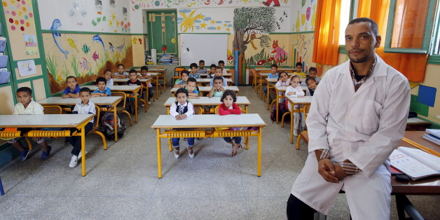 Teacher Moulay Ismael Lamrani poses for a picture with his class in the Oudaya primary school in Rabat, September 15, 2015, at the start of the new school year in Morocco. Nearly three years after Taliban gunmen shot Pakistani schoolgirl Malala Yousafzai, the teenage activist last week urged world leaders gathered in New York to help millions more children go to school. World Teachers' Day falls on 5 October, a Unesco initiative highlighting the work of educators struggling to teach children amid intimidation in Pakistan, conflict in Syria or poverty in Vietnam. Even so, there have been some improvements: the number of children not attending primary school has plummeted to an estimated 57 million worldwide in 2015, the U.N. says, down from 100 million 15 years ago. Reuters photographers have documented learning around the world, from well-resourced schools to pupils crammed into corridors in the Philippines, on boats in Brazil or in crowded classrooms in Burundi. REUTERS/Youssef BoudlalPICTURE 41 OF 47 FOR WIDER IMAGE STORY "SCHOOLS AROUND THE WORLD"SEARCH "EDUCATORS SCHOOLS" FOR ALL IMAGES