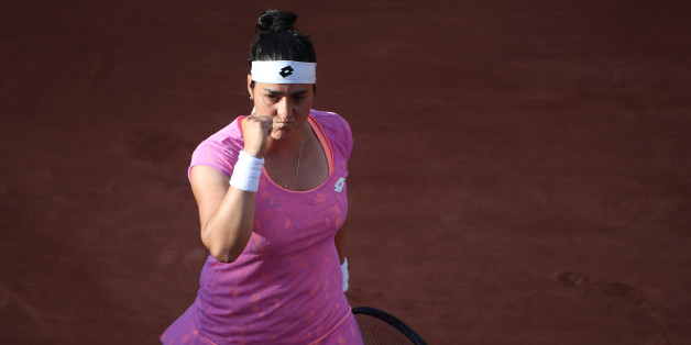 2017 French Open Tennis Tournament - Day Four. Ons Jabeur of Tunisia in action during her victory over Dominika Cibulkova of Slovakia in the Women's Singles second round match match at the 2017 French Open Tennis Tournament at Roland Garros on May 31st, 2017 in Paris, France. (Photo by Tim Clayton/Corbis via Getty Images)