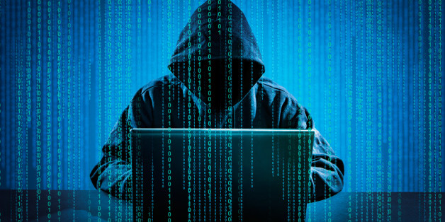 Hacker using laptop. Hacking the Internet.