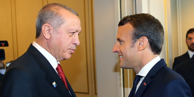 BRUSSELS, BELGIUM - MAY 25: Turkish President Recep Tayyip Erdogan (L) and French President Emmanuel Macron (R) shake hands during their meeting in Brussels, Belgium on May 25, 2017.
(Photo by Kayhan Ozer/Anadolu Agency/Getty Images)