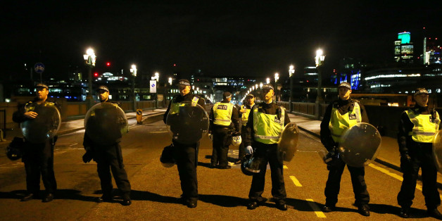 Police officers guard the approach to Southwark Bridge after an incident near London Bridge in London, Britain June 4, 2017. REUTERS/Neil Hall TPX IMAGES OF THE DAY