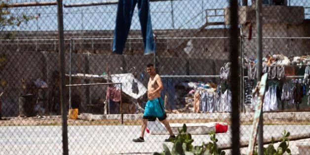 Inmates seen in the prison in Reynosa, Tamaulipas state, Mexico during a visit by journalists on May 24, 2017.
Two weeks ago, authorities found a tunnel and weapons buried inside the overcrowded prison in Reynosa, where 80 percent of the inmates belong to the Gulf Cartel. / AFP PHOTO / Julio Cesar AGUILAR (Photo credit should read JULIO CESAR AGUILAR/AFP/Getty Images)