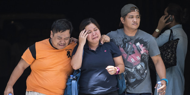 Relatives of a victim cry outside the Resorts World Hotel in Manila on June 2, 2017.
A masked gunman set fire to a gaming room at a casino in the Philippine capital on June 1, igniting a toxic blaze that killed 36 people, authorities said, but they insisted it was not a terrorist attack. / AFP PHOTO / RODY (Photo credit should read RODY/AFP/Getty Images)