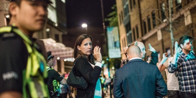 LONDON, UNITED KINGDOM - JUNE 03: People leave the area with their hands up after an incident near London Bridge on June 03, 2017 in London, England.Seven people were killed and 48 injured after three knife-wielding assailants led a deadly rampage through central London, plowing a van into pedestrians on London Bridge and then running to a nearby open-air market. PHOTOGRAPH BY Brais G. Rouco / Barcroft ImagesLondon-T:+44 207 033 1031 E:hello@barcroftmedia.com -New York-T:+1 212 796 2458 E:hello@