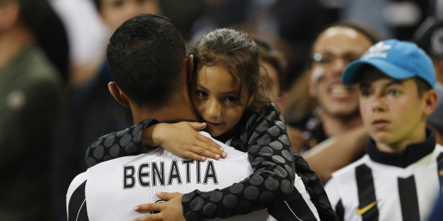 Britain Soccer Football - Juventus v Real Madrid - UEFA Champions League Final - The National Stadium of Wales, Cardiff - June 3, 2017 Juventus' Medhi Benatia with family after the match Reuters / John Sibley Livepic
