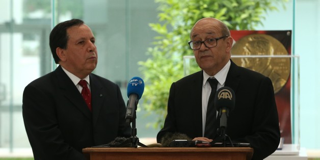 TUNIS, TUNISIA - JUNE 4: French Foreign Minister Jean-Yves Le Drian (L) and Tunisian Foreign Minister Khemaies Jhinaoui (R) hold a press conference after their meeting at the Bardo National Museum in Tunis, Tunisia on June 4, 2017. (Photo by Yassine Gaidi/Anadolu Agency/Getty Images)