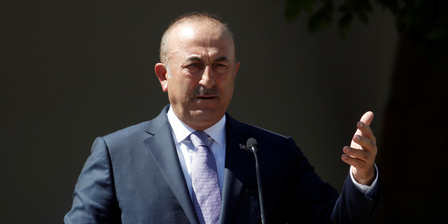 Turkey's Foreign Minister Mevlut Cavusoglu speaks to the media during a visit in the Turkish Cypriot northern part of the divided city of Nicosia, June 1, 2017. REUTERS/Yiannis Kourtoglou