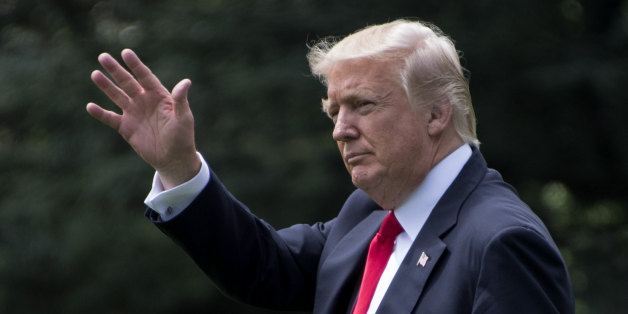US President Donald Trump waves as he departs the White House in Washington, DC, June 7, 2017.Trump travels to Cincinnati, Ohio, for a speech on infrastructure. / AFP PHOTO / JIM WATSON (Photo credit should read JIM WATSON/AFP/Getty Images)