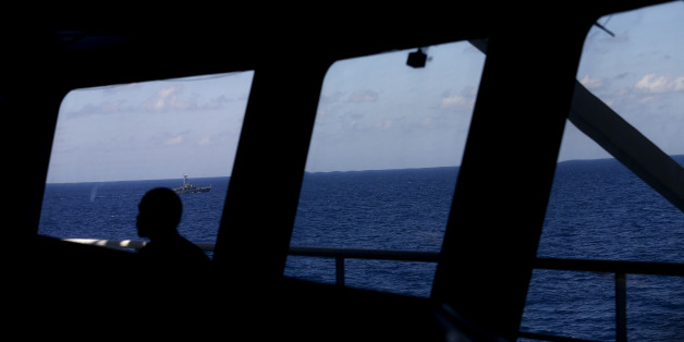 Myanmar Navy ship is seen at Andaman sea to escort Nautical Aliya bringing Food for Rohingya refugee to Myanmar on February 7, 2017. According to Kelab Putra 1 Malaysia NGO, Abd Azeez Rahim received an official letter from the Goverment of Bangladesh embassy in Malaysia not allow the Humanitarian Mission-Food Flottila for Myanmar to dock at Teknaf port in Bangladesh to provide humanitarian aid to the Rohingya refugees. More than 31 Non-goverment organisations (NGO) include Mapim and Kelab Putra 1 Malaysia from Malaysia, Indonesia, China, France, Germany, and Canada bring almost 2000 tans thing include medicine, food, cooking oil and cloth were sending to ethnic minority Rohingya in Yangon and Teknaf. (Photo by Samsul Said/NurPhoto via Getty Images)