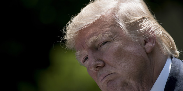 US President Donald Trump pauses during a press conference with Romania's President Klaus Iohannis in the Rose Garden of the White House June 9, 2017 in Washington, DC. / AFP PHOTO / Brendan Smialowski (Photo credit should read BRENDAN SMIALOWSKI/AFP/Getty Images)