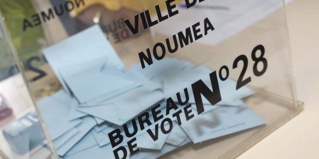 People go to polls in Noumea, New Caledonia island on June 11, 2017 to choose members of the French National Assembly, the country's lower house of parliament, in the first round of country's legislative elections.
Prior to the beginning of voting in Metropolitan France, it started in the overseas territories and departments of France. Polling stations for the voters of Guadeloupe, French Guiana, Martinique, St. Barthelemy, St. Martin, St. Pierre and Miquelon opened on Saturday. / AFP PHOTO / Fred Payet (Photo credit should read FRED PAYET/AFP/Getty Images)