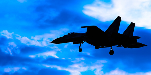 Contour aircraft Su-27 against the sky
