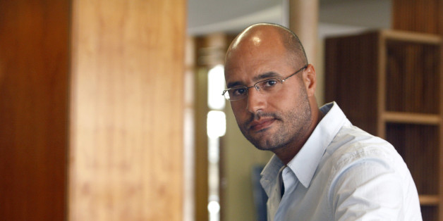 Saif al-Islam, son of Libyan leader Muammar Gaddafi, indicates that Libya plans an enhanced oil recovery round to develop its production capacity during an interview with Reuters in Nice July 30, 2007. Libya has held three oil exploration licensing rounds since the end of Western sanctions against the government in 2004, awarding permits to firms in what is considered one of the world's last under-explored oil-promising regions. REUTERS/Gilbert Tourte (FRANCE)