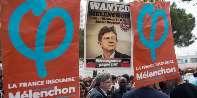 Leader of the political movement 'La France Insoumise', former French presidential candidate and current candidate in Marseille for France's upcoming legislative elections, Jean-Luc Melenchon (C), speaks with people during a campaign visit to the Cite Felix Pyat in Marseille, southeastern France, on June 3, 2017.
The two-round parliamentary elections will take place on June 11 and June 18. / AFP PHOTO / BERTRAND LANGLOIS (Photo credit should read BERTRAND LANGLOIS/AFP/Getty Images)