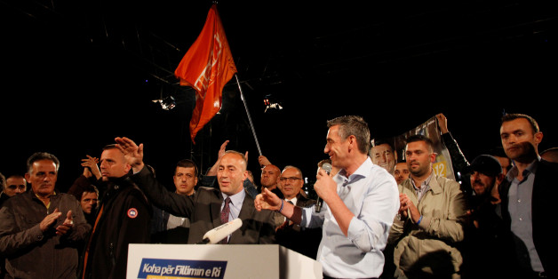 Ramush Haradinaj, candidate for prime minister and Kadri Veseli, the head of Democratic Party of Kosovo (PDK), speak to the supporters of the coalition of the former Kosovo Liberation Army (KLA) commanders AAK, PDK and NISMA after first results of the Parliamentary elections in Pristina, Kosovo, June 12, 2017. REUTERS/Agron Beqiri