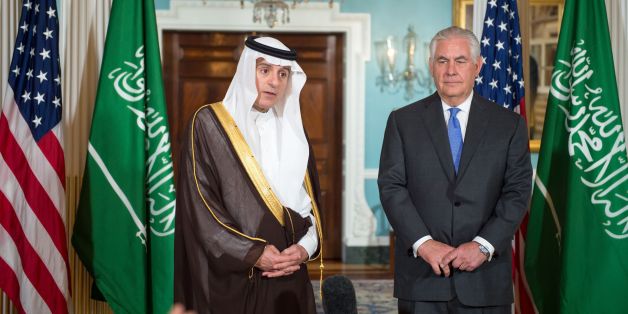 US Secretary of State Rex Tillerson listens as Saudi Foreign Minister Adel al-Jubeir(L) delivers brief remarks to the media on June 13, 2017, shortly before their private meeting at the US Department of State in Washington, DC. / AFP PHOTO / PAUL J. RICHARDS (Photo credit should read PAUL J. RICHARDS/AFP/Getty Images)