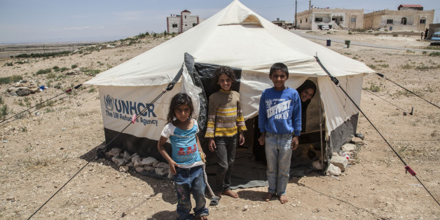 Syrian refugees are seen at the Zaatari refugee camp, on the Jordanian border on 31 May 2017. It's the second refugee camp in the world . The field of Zaatari grows and spreads in the middle of nowhere. Of temporary solution to being the second largest refugee camp in the world and the fourth largest city in Jordan. Besieged by concertinas and guarded by the Jordanian army, the settlement currently accommodates 85,000 Syrian refugees, half of them children. (Photo by Alvaro Fuente/NurPhoto via Getty Images)